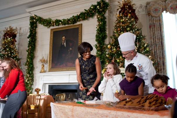 Young Visitor Tastes Her Decorated Cookie 