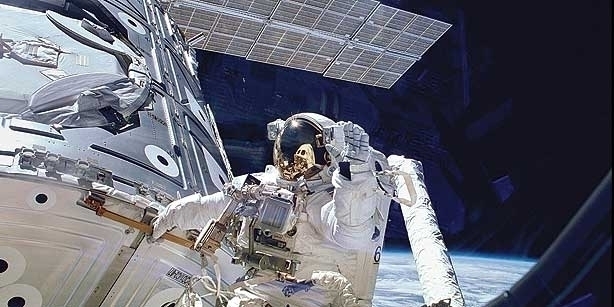 Astronauts nail first spacewalk to fix station’s cooling system