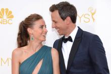 Alexi Ashe (l) and Seth Meyers (r) of Late Night With Seth Meyers arrive at the 66th Emmys.