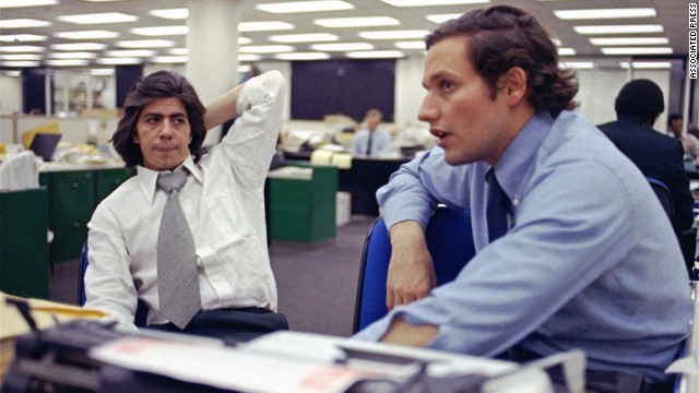 Reporters Carl Bernstein, left, and Bob Woodward in the newsroom in 1973, during the Washington Post's ongoing coverage of what became known simply as Watergate.