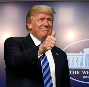 U.S. President Donald Trump gives a thumbs up as he hosts a CEO town hall on the American business climate at the Eisenhower Executive Office Building in Washington, U.S., April 4, 2017