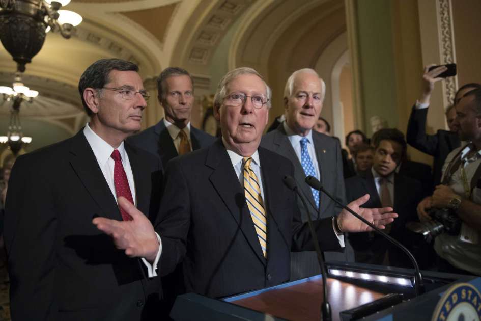 Senate Majority Leader Mitch McConnell of Ky., joined by, from left, Sen. John Barrasso, R-Wyo., Sen. John Thune, R-S.D., and Majority Whip John Cornyn, R-Texas, speak with reporters on Capitol Hill in Washington, Tuesday, July 25, 2017, after Vice President Mike Pence broke a 50-50 tie to start debating Republican legislation to tear down much of the Obama health care law.