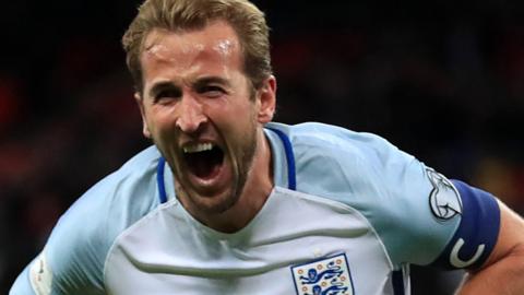 Harry Kane celebrates scoring for England
