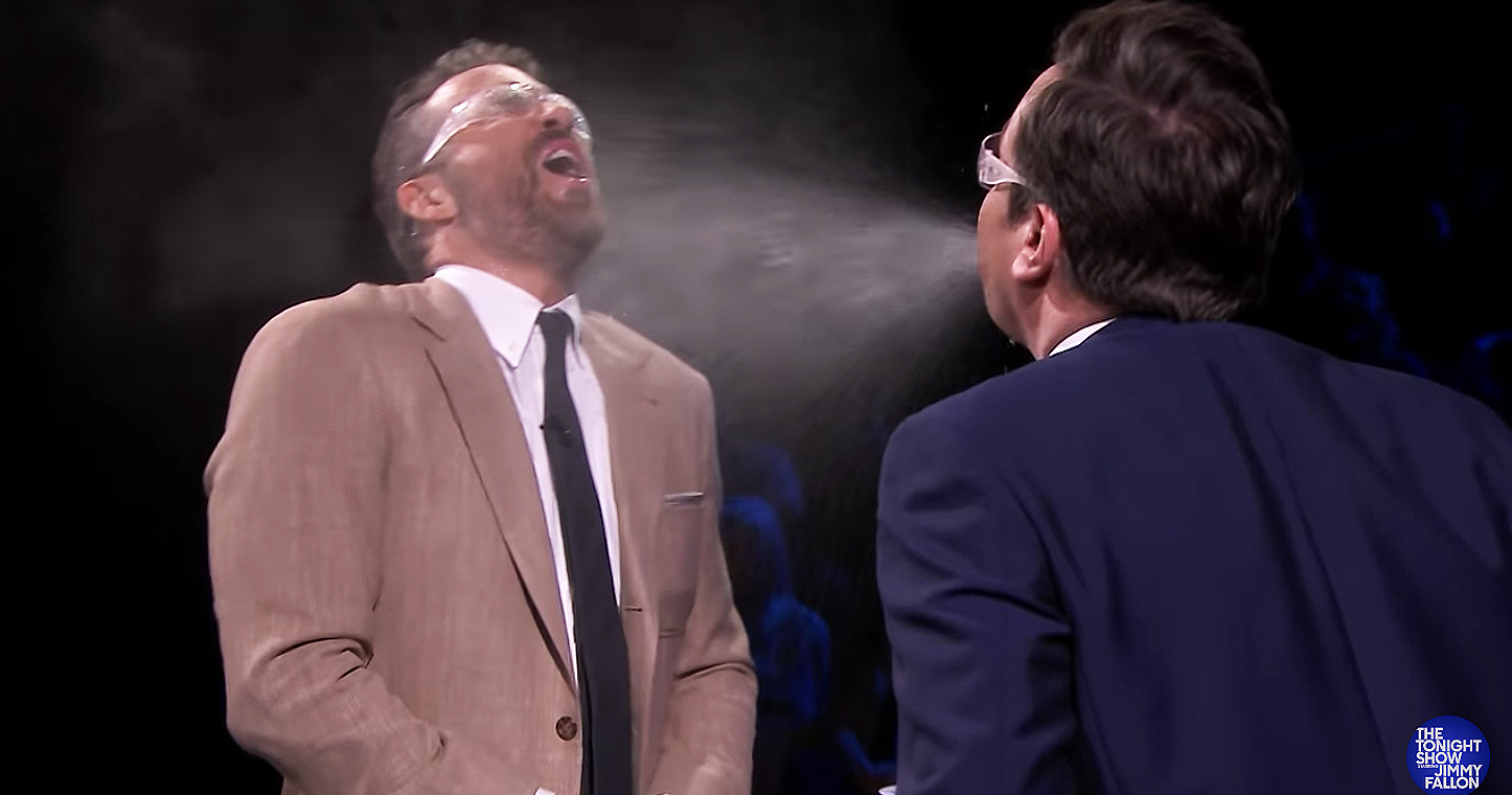 Watch Ryan Reynolds and Jimmy Fallon spit in each other's faces — because why not?