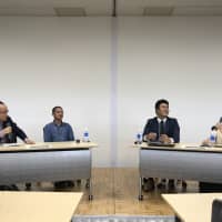 Entrepreneurs hold a discussion at a symposium co-hosted by the Japan Times Satoyama Consortium in Jinsekikogen, Hiroshima Prefecture, on Oct. 20.
