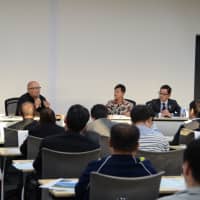 Panelists hold a discussion on education and regional revitalization in a symposium co-hosted by the Japan Times Satoyama Consortium in Jinsekikogen, Hiroshima Prefecture, on Oct. 20.