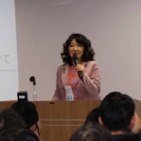 Minister of State for Regional Revitalization Satsuki Katayama delivers the keynote speech at a symposium in Tokyo on Feb 3.