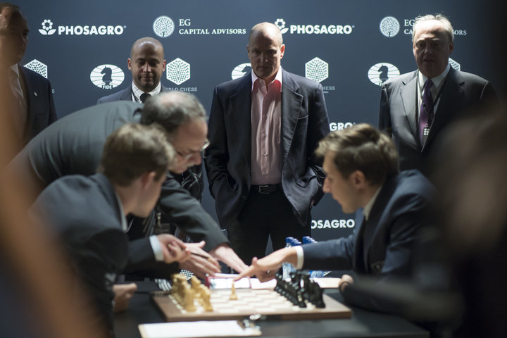 Woody Harrelson watches the opening moves of the world chess championship in New York