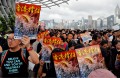 Protesters reach out to mainland visitors