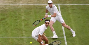 Britain's Andy Murray in action with France's Pierre-Hugues Herbert during a doubles match at the recent Wimbledon Championship. Hong Kong authorities are facing calls to promote greater access to live sports broadcasts. Photo: Reuters