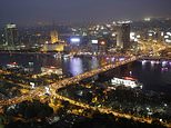 FILE - In this Tuesday, May 5, 2015 file photo, rush hour traffic fills the 6 October bridge over the Nile River in Cairo, Egypt. Uber is launching a new minibus service on Tuesday, Dec. 4, 2018, in traffic-mad Cairo, Egypt's capital and the ride-sharing U.S. giant's fastest-growing market. (AP Photo/Hassan Ammar, File)