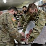 Washington National Guard members assemble food packages at the Helping Hands Food Bank in Sedro-Woolley, Wash., on Monday, May 18, 2020. <br>Master Sgt. John Hughel/Washington Air National Guard