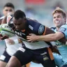 Tevita Kuridrani of the Brumbies is tackled by NSW playmaker Will Harrison during round seven of Super Rugby, just before the season was suspended.