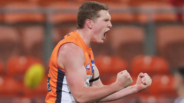 Tom Green celebrates a goal during the Giants' two-point win over Collingwood.