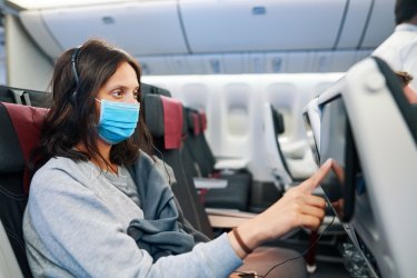 mask plane coronavirus pandemic covid-19 flight Alamy one time use for Traveller, only
