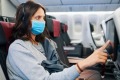 mask on plane covid-19 coronavirus economy pandemic Traveller one time use only