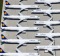 Lufthansa planes sitting on the tarmac at the Berlin Brandenburg International Airport.