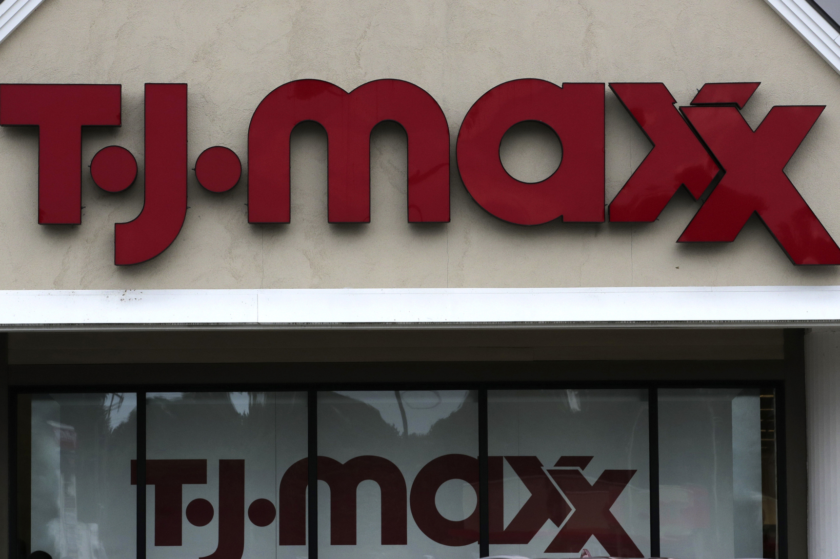 TJ Maxx logo on a store in Manchester, N.H.