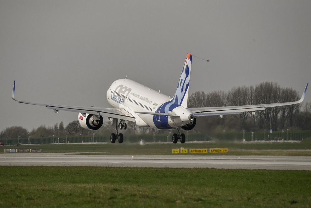 A rear view of Airbus’ first A319neo as the aircraft takes for its maiden flight from Germany’s Hamburg-Finkenwerder Airport