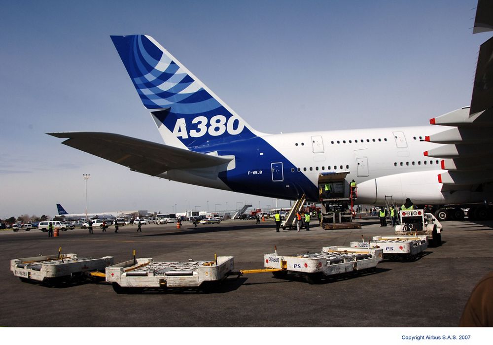 Cargo is unloaded from a parked Airbus A380