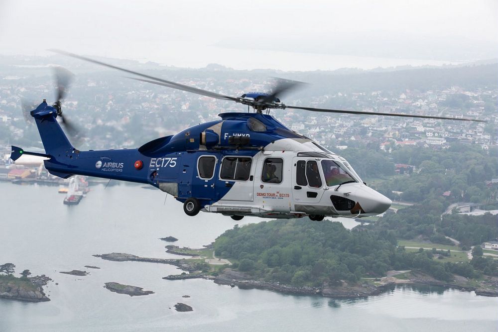 Side view of an in-flight Airbus H175 helicopter configured for aerial work.  