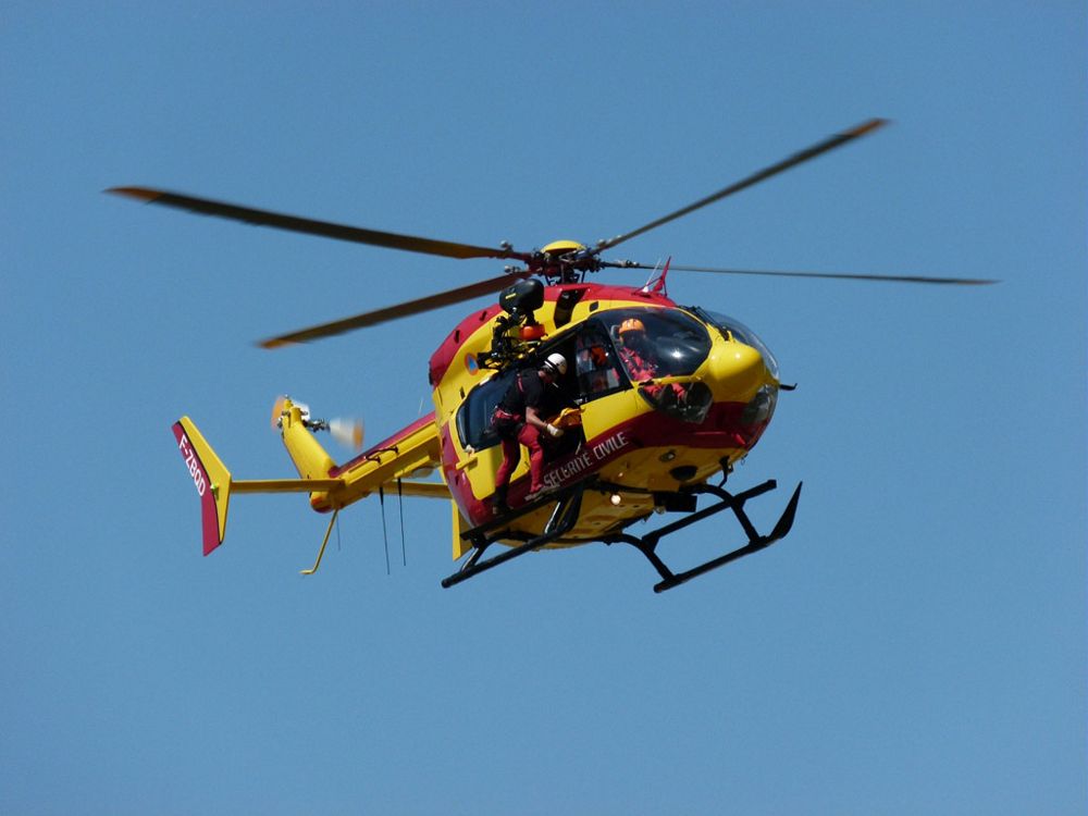 An in-flight Airbus H145 helicopter configured for parapublic missions. 