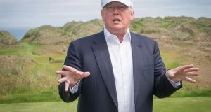 File photograph of  Donald Trump at a golf course in Scotland.  Photograph: Mihcal Wachucil/AFP 