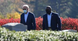 President-elect Joe Biden leaves after visiting his family grave site at St. Joseph on the Brandywine Roman Catholic Church in Wilmington, Delaware . Photograph:  Angela Weiss/AFP via Getty Images
