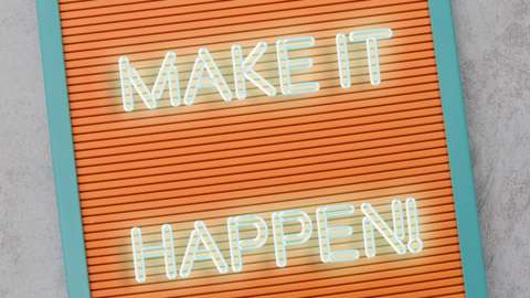 A vision board that reads 'Make it happen!'