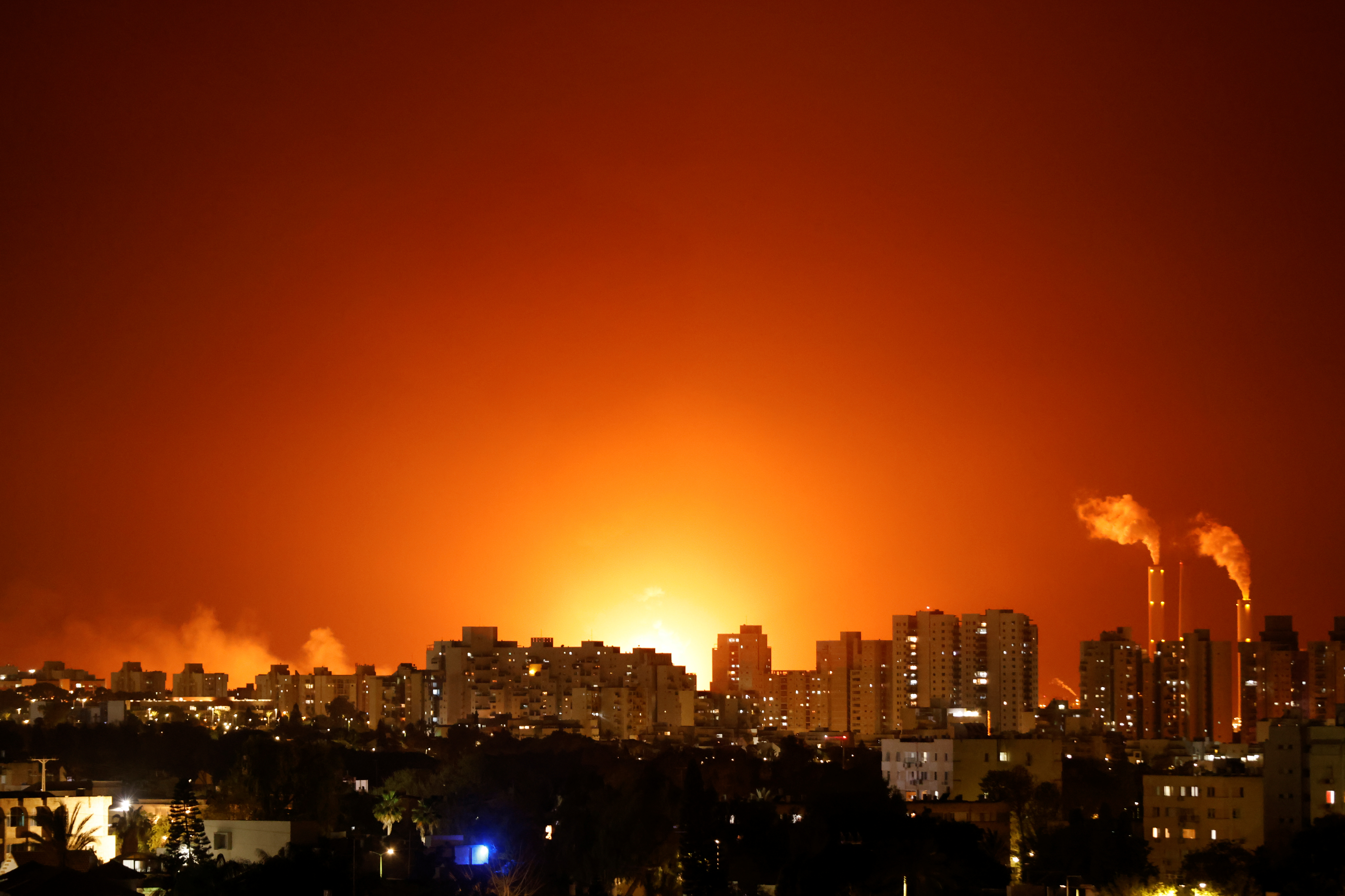 A large fire is seen near the scene of what officials said was a Gaza rocket attack on an Israeli energy pipeline near Ashkelon, Israel, May 11, 2021. REUTERS/Amir Cohen