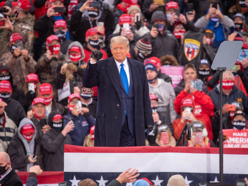 President Donald Trump greets supporters at a campaign rally at the Capital Region International Airport on Tuesday, Oct. 27, in Lansing.