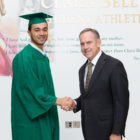 2018 Michigan State graduate Damion Terry pictured with football head coach Mark Dantonio.