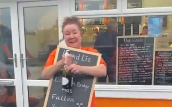 Jacki Pickett, the owner of Jaki Fish and Chip Shop, shared a video of herself on Thursday spraying champagne to celebrate the Queen's death