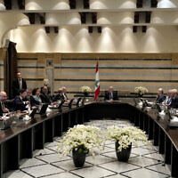 Lebanese caretaker Prime Minister Najib Mikati, center, heads a cabinet meeting in Beirut, Lebanon, January 18, 2023. (Bilal Hussein/AP)