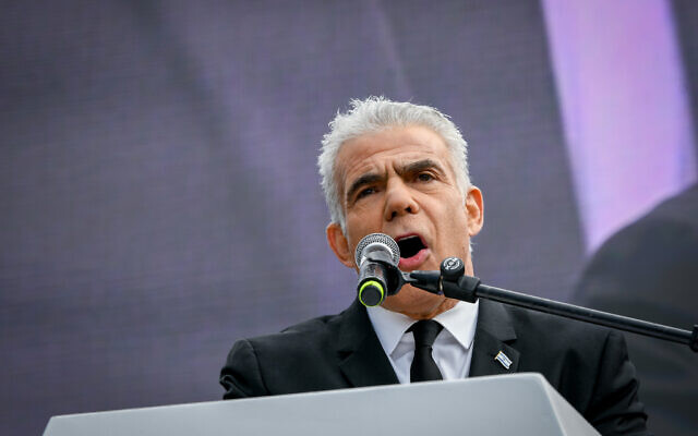Opposition leader Yair Lapid speaks at a protest against the judicial overhaul, February 13, 2023. (Arie Leib Abrams/ Flash90)
