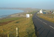 The A847 in a frosty morning by the sea.