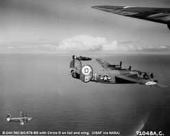 Consolidated B-24 Liberators of the 392d Bomb Group on a mission over enemy-occupied territory