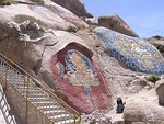 The Tsongkhapa and other deities painted on rock on the approach to hermitage