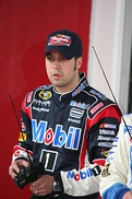 Sam Hornish Jr. (left) won his second Drivers' Championship (second straight title) while Hélio Castroneves (right) finished second in the championship.