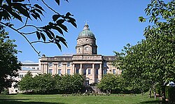 View of hospital building showing dome and clock