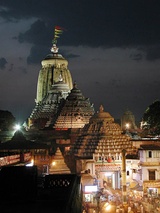 The Jagannath temple in Puri, Odisha. It is a major historic Hindu pilgrimage site. Left: An artist's sketch in 1915.