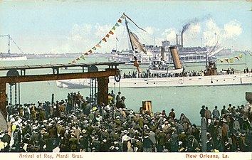 Arrival of Rex, monarch of Mardi Gras, as seen on an early 20th-century postcard
