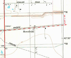 Howellville appears on a 1982 USGS map. State Highway 6 is the vertical red line at left while Alief-Clodine Road is the dashed red and white line from left to right.