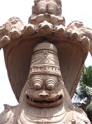 Jagannath (left) may have roots in Narasimha[113] (right, man-lion avatar of Vishnu who fights evil demon and ends religious persecution).[114]