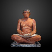 The Seated Scribe; 2613–2494 BC; painted limestone and inlaid quartz; height: 53.7 cm