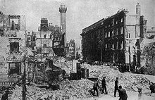 external scene showing ruined buildings in a city street