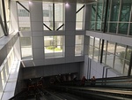 Escalators from the elevated section of the link descending to the underground section