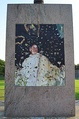 A stone mural marks the spot of his death