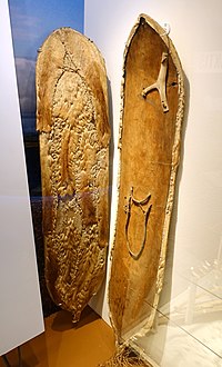 Prehistoric (791–540 BCE) solid-wood "ski-snowshoe" found in the mountain glaciers of Norway. The carved horizontal hole was used to tie it onto the foot, as in traditional European skis (which seem to have been far more common); the bottom is unworn, so it was probably covered in fur for grip.[6]