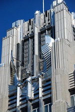 The facade of the Niagara Mohawk Building, in Syracuse, New York, (1932), a power utility company, features a statue of "The Spirit of Light"